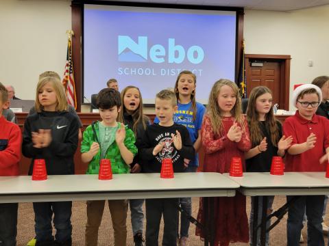 3rd Graders Performing Jingle Bells for the School Board